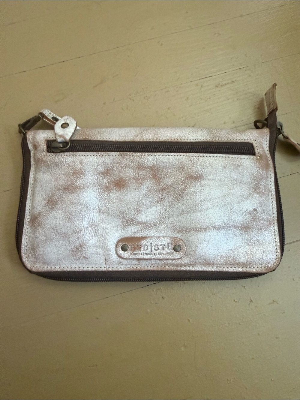 BED|STU Metallic Ivory and Brown Wristlet Clutch